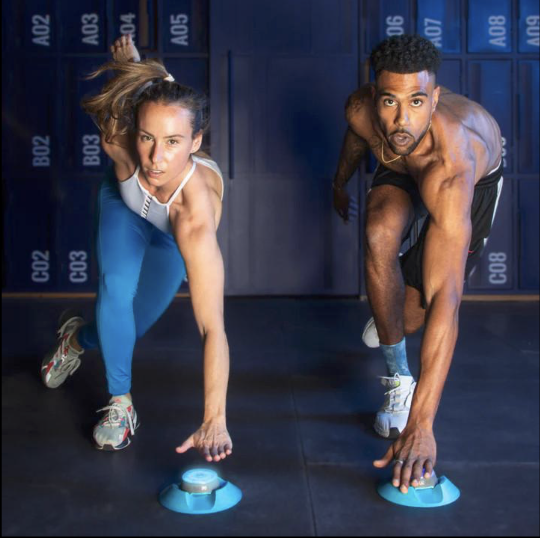 Athletes reaching for BlazePod reaction lights